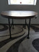 Outdoor Exterior Grade Reclaimed Distressed Round Dining Table. Heavy Duty Iron Pipe legs.