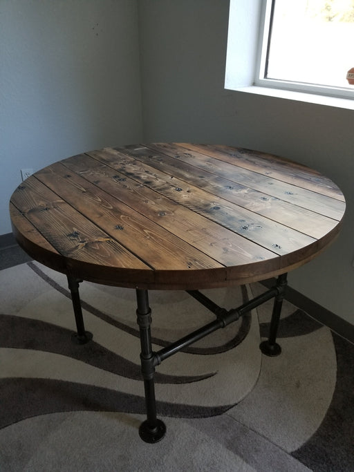 Outdoor Exterior Grade Reclaimed Distressed Round Dining Table. Heavy Duty Iron Pipe legs.