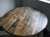 Outdoor Exterior Grade Reclaimed Distressed Round Dining Table. Heavy Duty Iron Pipe legs.